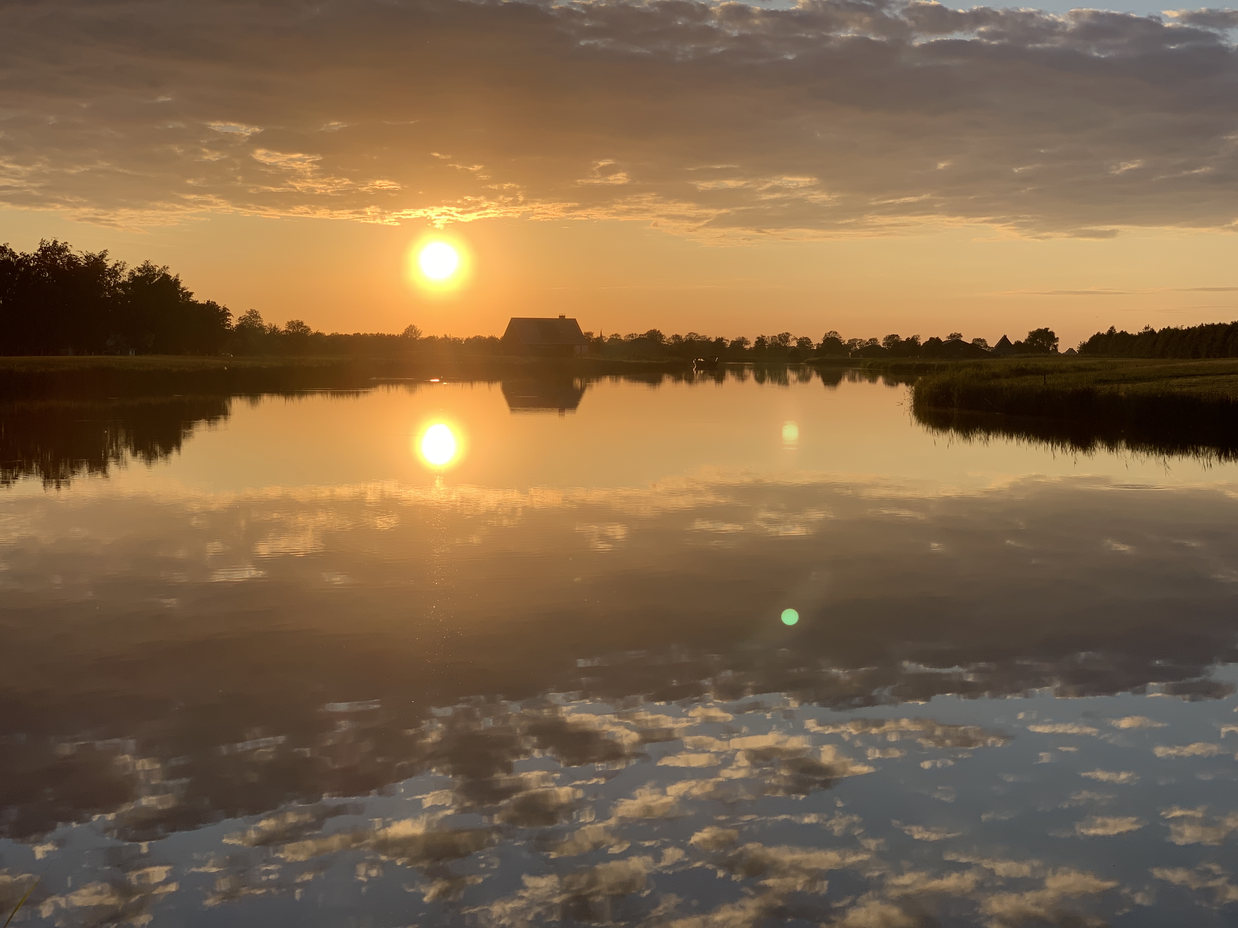 Zonsondergang boven Meer van Eysinga